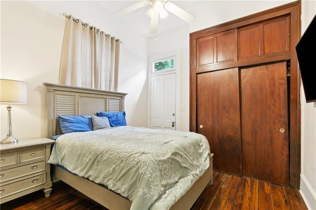 332426 Banks St, New Orleans, LA 70119 - bedroom featuring dark wood finished floors and a closet