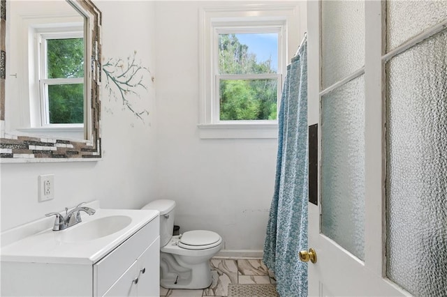 332426 Banks St, New Orleans, LA 70119 - bathroom featuring toilet and vanity