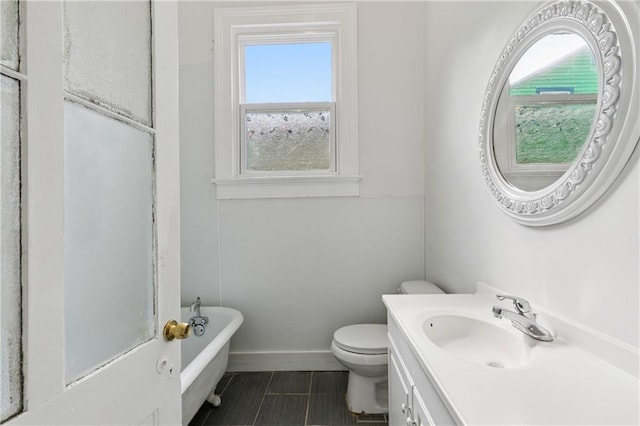332426 Banks St, New Orleans, LA 70119 - bathroom featuring a soaking tub, vanity, plenty of natural light, and tile patterned floors