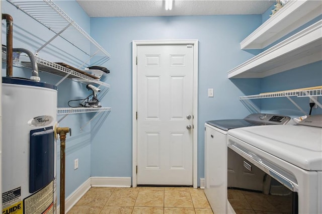 213 Chimaera Ln, Slidell, LA 70458 - washroom with water heater, washer and dryer, and light tile patterned flooring