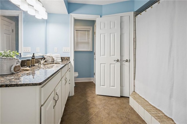 213 Chimaera Ln, Slidell, LA 70458 - bathroom featuring vanity, tile patterned floors, and curtained shower