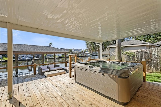 213 Chimaera Ln, Slidell, LA 70458 - wooden terrace featuring a water view, a hot tub, a dock, and boat lift