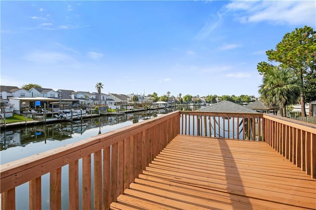 213 Chimaera Ln, Slidell, LA 70458 - wooden deck featuring a water view and a residential view