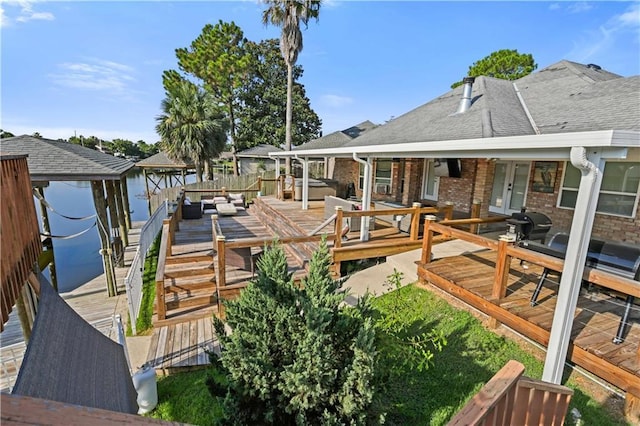 213 Chimaera Ln, Slidell, LA 70458 - wooden terrace featuring french doors, boat lift, and a boat dock