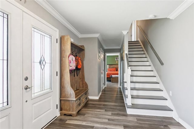 5924 Bellingham Pl, Metairie, LA 70003 - foyer entrance featuring wood finished floors, stairs, ornamental molding, and healthy amount of natural light