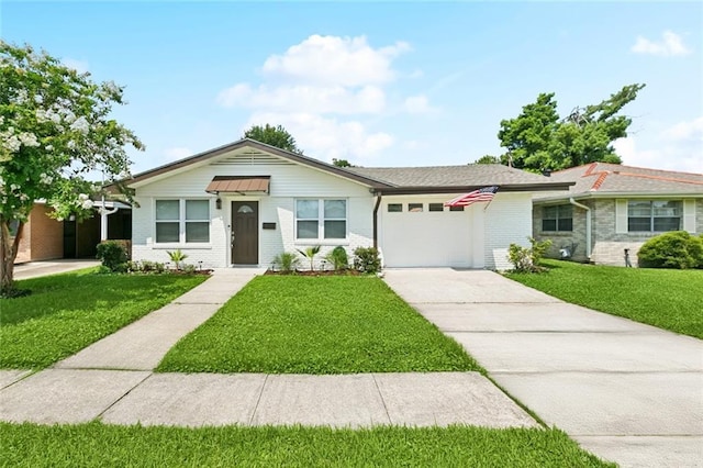 1112 Kent Ave, Metairie, LA 70001 - single story home featuring a garage, brick siding, and a front yard