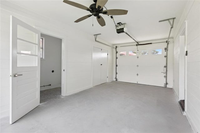 1112 Kent Ave, Metairie, LA 70001 - garage featuring a garage door opener and ceiling fan