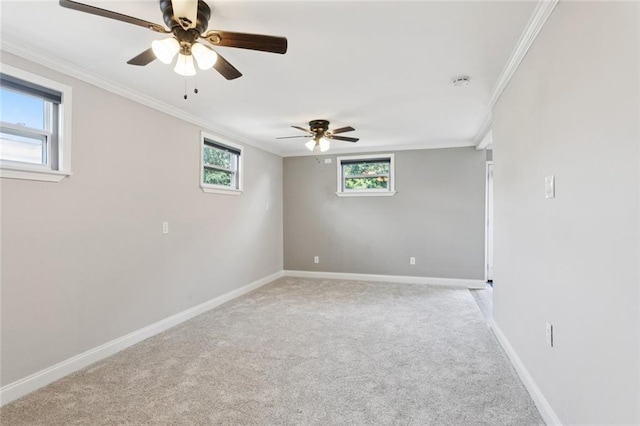 8021 Shirley St, Metairie, LA 70003 - spare room with ornamental molding, light carpet, ceiling fan, healthy amount of natural light, and a smoke detector