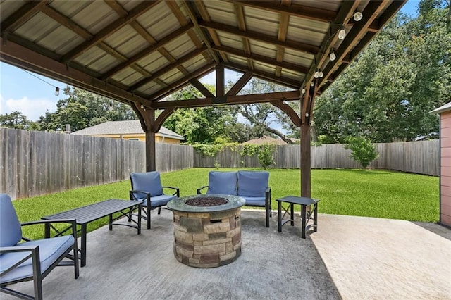 8021 Shirley St, Metairie, LA 70003 - fenced backyard with an outdoor fire pit, a patio area, and a gazebo
