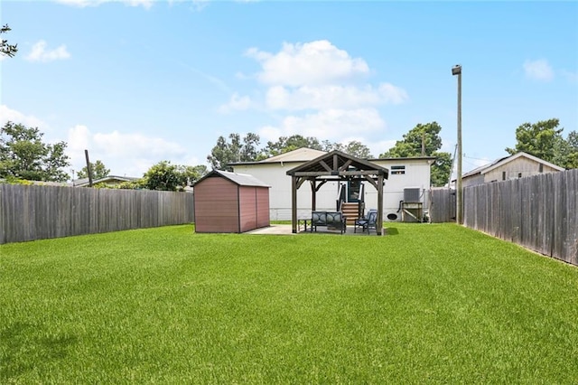 8021 Shirley St, Metairie, LA 70003 - fenced backyard featuring a storage shed, a gazebo, and a patio