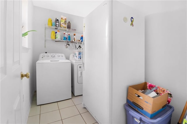 1022 Forest Ridge Loop, Pearl River, LA 70452 - laundry area featuring independent washer and dryer and light tile patterned flooring