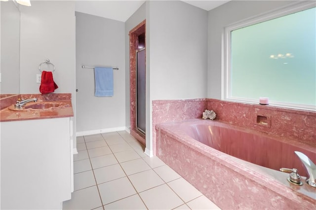 1022 Forest Ridge Loop, Pearl River, LA 70452 - bathroom with a bath, vanity, tile patterned floors, and a stall shower