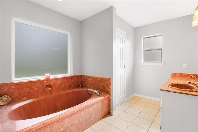 1022 Forest Ridge Loop, Pearl River, LA 70452 - full bathroom with a garden tub, vanity, and tile patterned flooring