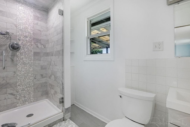 405 Jade Ave, Metairie, LA 70003 - bathroom featuring a shower stall, ornamental molding, and vanity