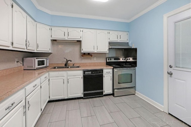 405 Jade Ave, Metairie, LA 70003 - kitchen with black dishwasher, stainless steel electric stove, white microwave, under cabinet range hood, and white cabinetry