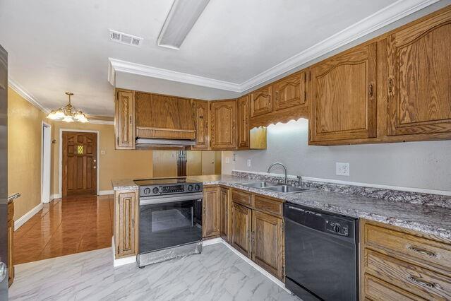 1832 Faith Pl, Gretna, LA 70056 - kitchen featuring dishwasher, electric stove, crown molding, a chandelier, and brown cabinetry