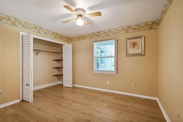 1832 Faith Pl, Gretna, LA 70056 - unfurnished bedroom with light wood-style floors, a closet, and a ceiling fan