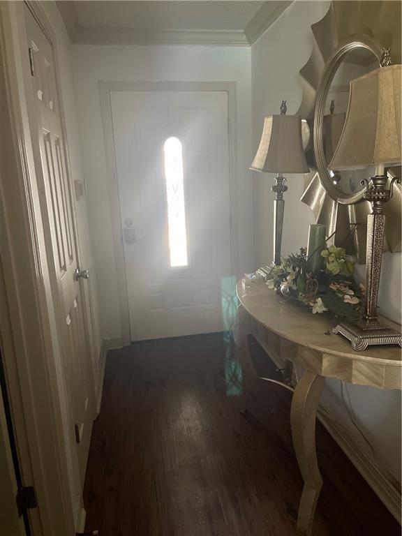 722 Marina Dr Unit 722, Slidell, LA 70458 - foyer entrance featuring wood finished floors and crown molding