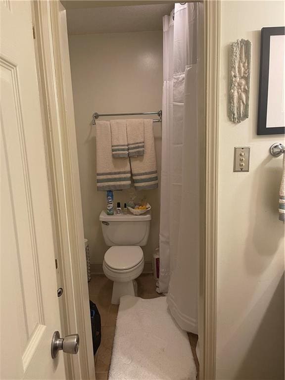 722 Marina Dr Unit 722, Slidell, LA 70458 - full bath with tile patterned floors and a shower with shower curtain
