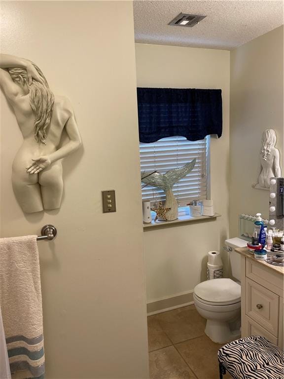 722 Marina Dr Unit 722, Slidell, LA 70458 - bathroom featuring tile patterned floors, a textured ceiling, and vanity