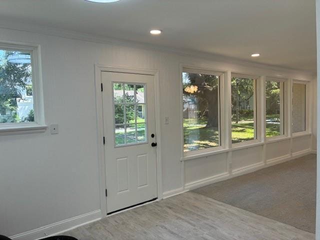 29 Snipe St, New Orleans, LA 70124 - doorway to outside with ornamental molding, recessed lighting, and wood finished floors