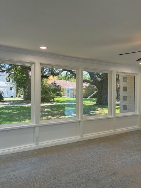 29 Snipe St, New Orleans, LA 70124 - detailed view of ornamental molding, carpet floors, and ceiling fan