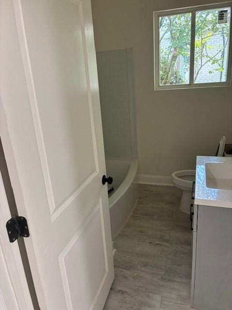 29 Snipe St, New Orleans, LA 70124 - full bathroom featuring vanity, a bath, and wood finished floors