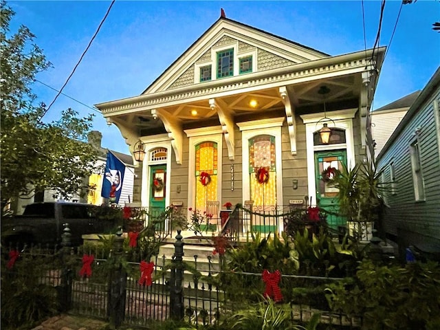 91315 Arabella St, New Orleans, LA 70115 - view of front of house with a porch