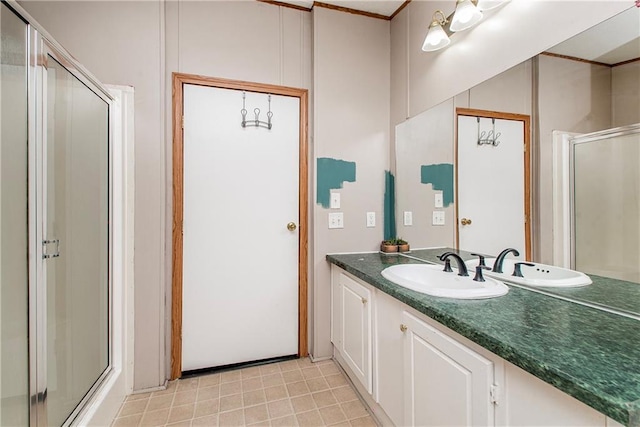 25169 Stepp Rd, Robert, LA 70455 - bathroom featuring a stall shower, vanity, and tile patterned flooring