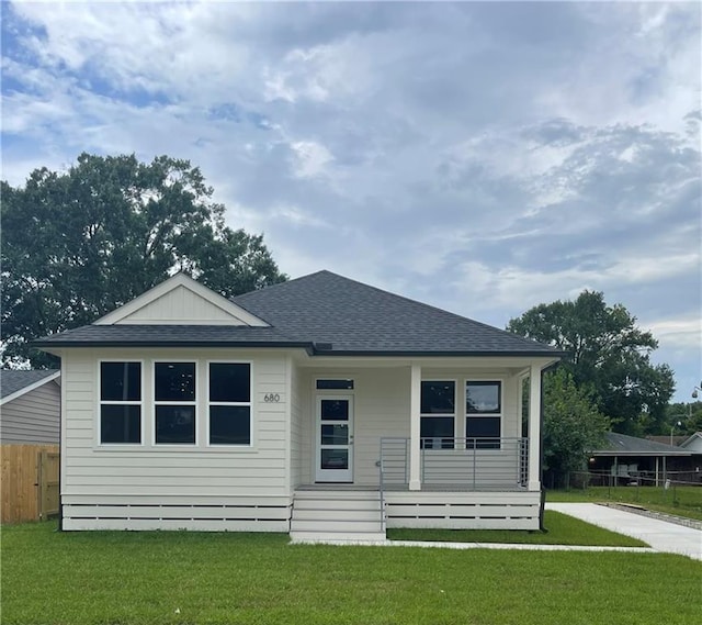 680 Hunterbrook Dr, Gretna, LA 70056 - view of front facade with roof with shingles and a porch