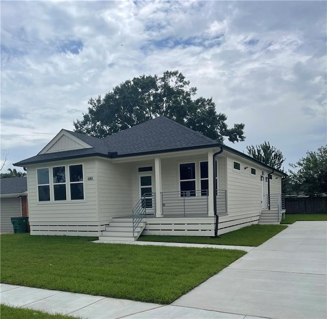 680 Hunterbrook Dr, Gretna, LA 70056 - manufactured / mobile home with a porch, roof with shingles, and driveway