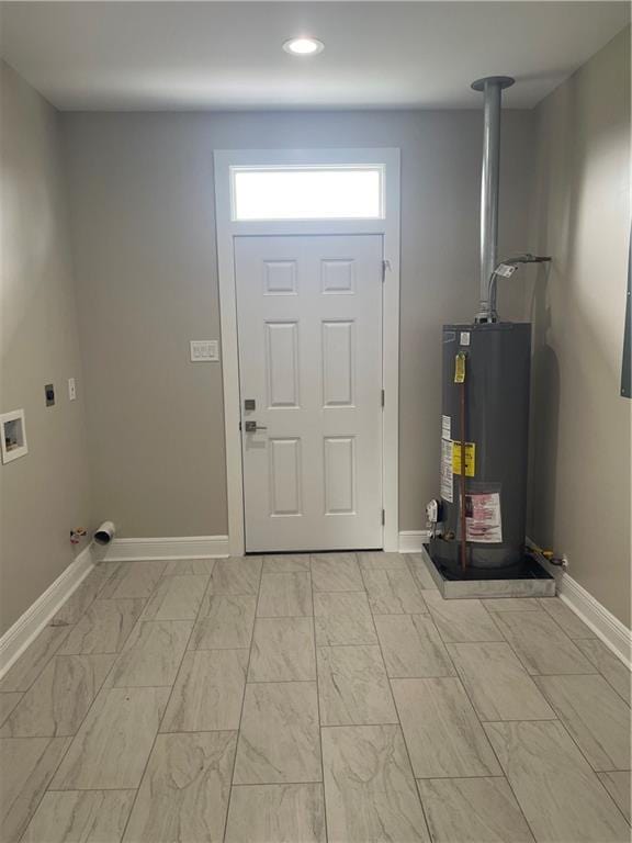 680 Hunterbrook Dr, Gretna, LA 70056 - entryway featuring gas water heater, light marble finish floors, and recessed lighting
