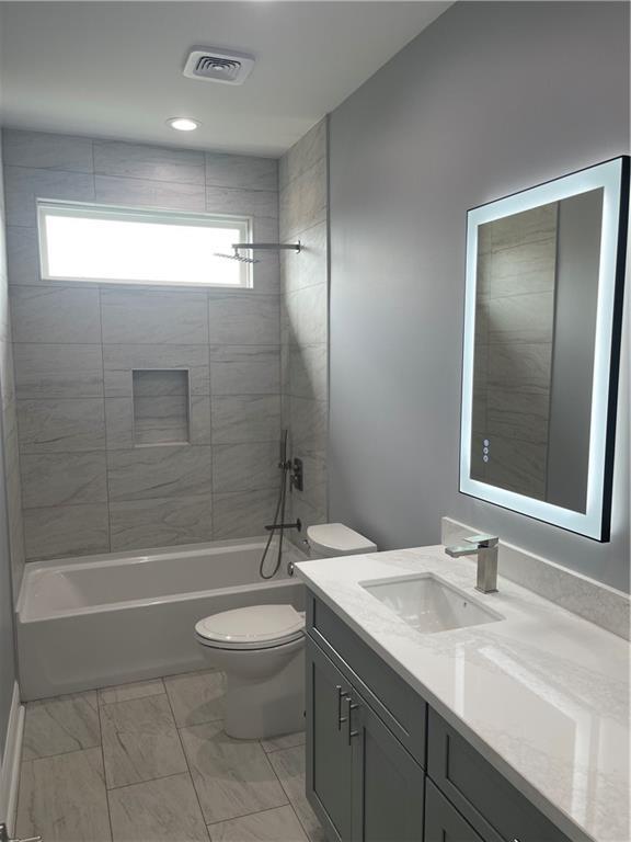 680 Hunterbrook Dr, Gretna, LA 70056 - full bathroom with vanity and tub / shower combination
