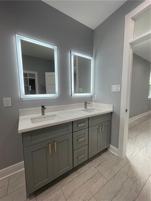 680 Hunterbrook Dr, Gretna, LA 70056 - full bathroom featuring double vanity and marble look tile flooring