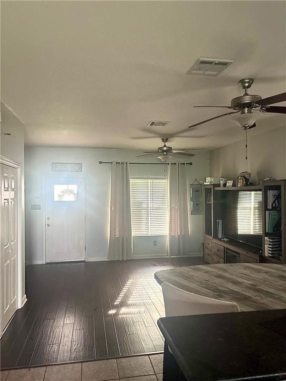 5817 Providence Pl, New Orleans, LA 70126 - tiled living room featuring ceiling fan