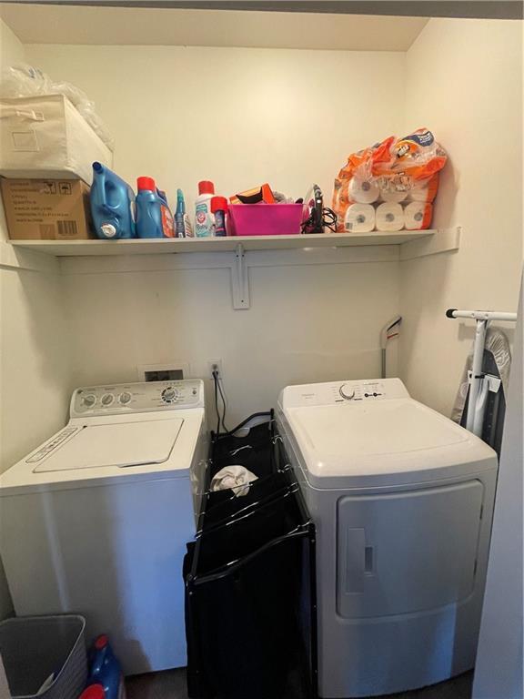 5817 Providence Pl, New Orleans, LA 70126 - laundry room with washing machine and clothes dryer