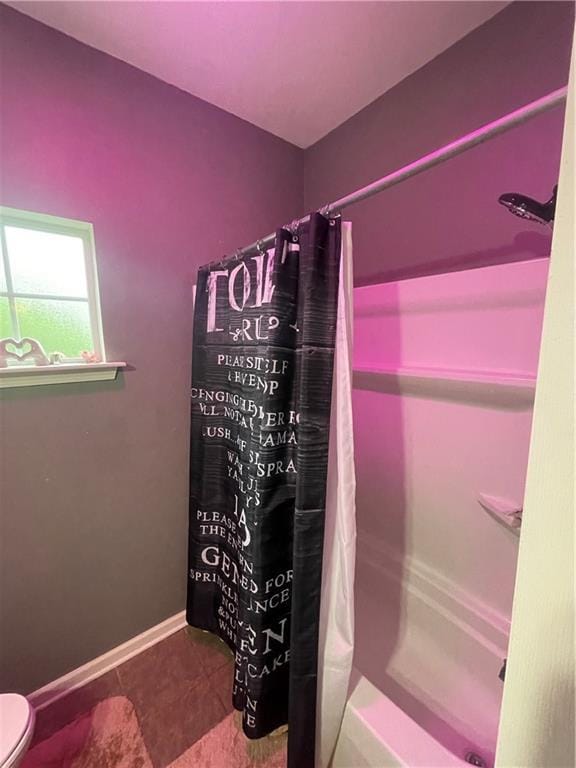 5817 Providence Pl, New Orleans, LA 70126 - bathroom with toilet and tile patterned flooring