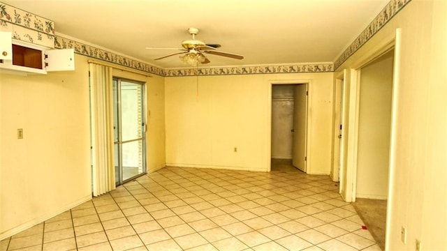 218 Mockingbird Ln, Slidell, LA 70458 - spare room featuring ceiling fan and light tile patterned floors