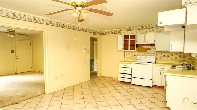 218 Mockingbird Ln, Slidell, LA 70458 - kitchen with white range with electric cooktop, a ceiling fan, light countertops, and open shelves