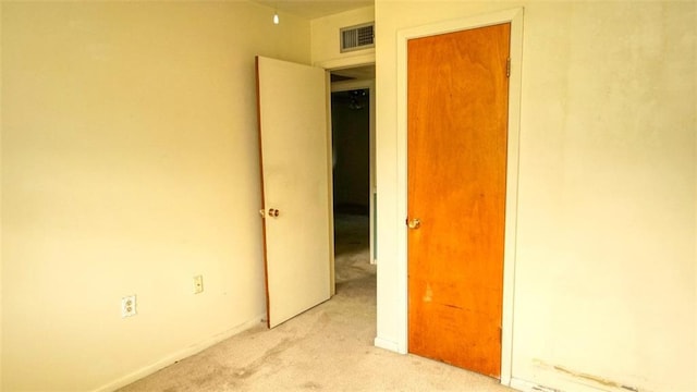 218 Mockingbird Ln, Slidell, LA 70458 - spare room featuring light carpet and baseboards