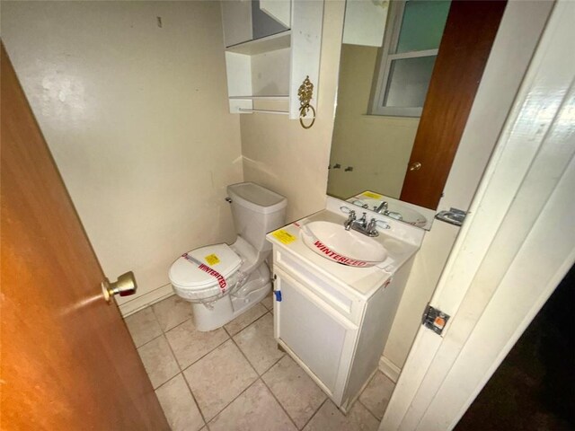 218 Mockingbird Ln, Slidell, LA 70458 - bathroom with vanity and tile patterned flooring