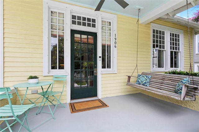 1906 Audubon St, New Orleans, LA 70118 - property entrance with a ceiling fan and covered porch