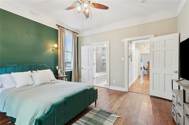 1906 Audubon St, New Orleans, LA 70118 - bedroom featuring hardwood / wood-style floors, ensuite bathroom, and ceiling fan