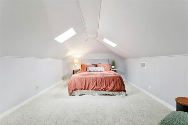 1906 Audubon St, New Orleans, LA 70118 - bedroom featuring a skylight, carpet floors, and vaulted ceiling