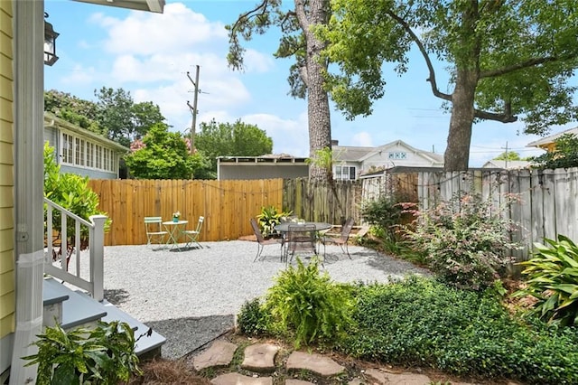 1906 Audubon St, New Orleans, LA 70118 - fenced backyard with a patio area