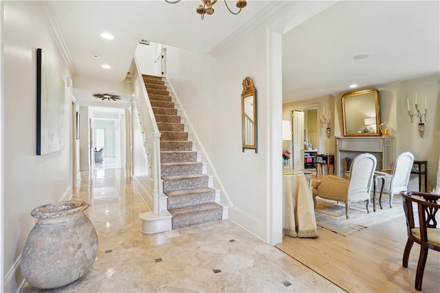 450 Fairway Dr, New Orleans, LA 70124 - staircase featuring crown molding, recessed lighting, and a fireplace