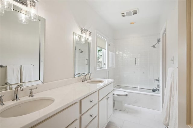 450 Fairway Dr, New Orleans, LA 70124 - bathroom featuring double vanity and bath / shower combo with glass door