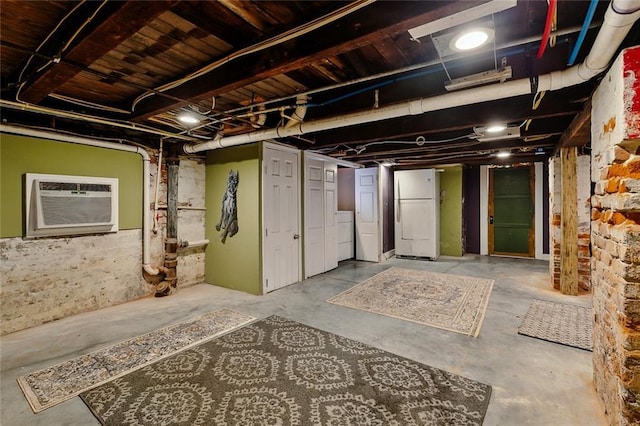 1421 Kentucky St, New Orleans, LA 70117 - unfinished below grade area featuring washer / dryer and freestanding refrigerator