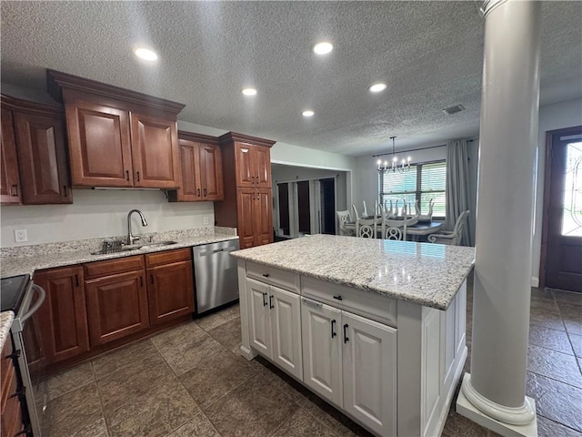 624 Taylorbrook St, Gretna, LA 70053 - kitchen with appliances with stainless steel finishes, a textured ceiling, a chandelier, a center island, and recessed lighting