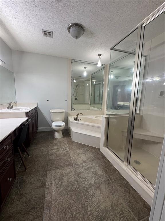 624 Taylorbrook St, Gretna, LA 70053 - full bath with a shower stall, vanity, a bath, and a textured ceiling